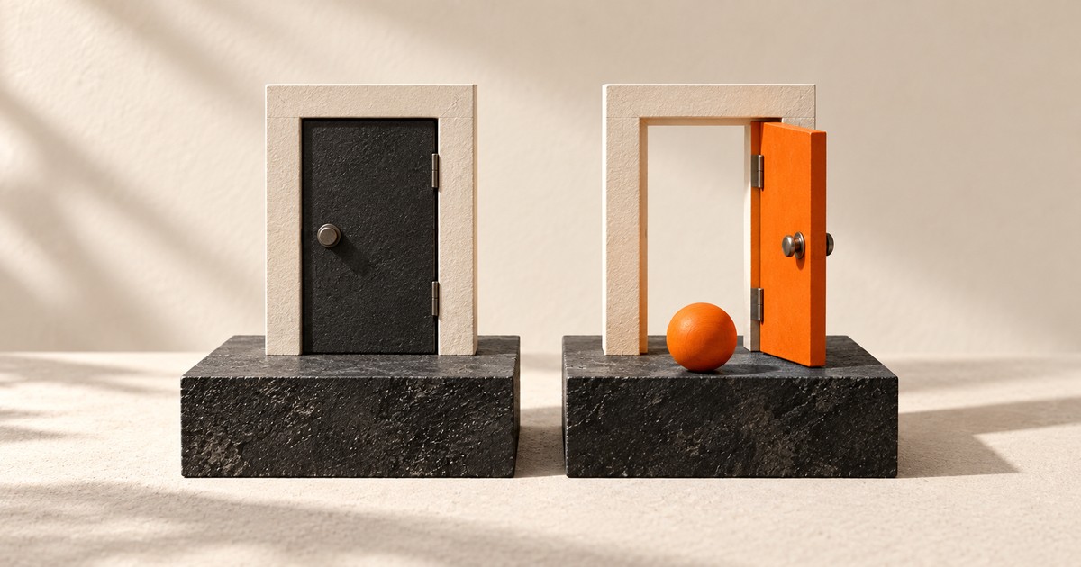 A closed dark door beside an open orange door.